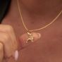 Lily Charmed Sausage Dog Charm Gold - item number CGSD