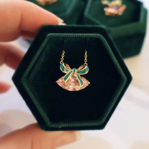 Amelia Scott Gold Bow Necklace with Emerald Green Enamel and Blush Pink Zirconia AS22TRN89